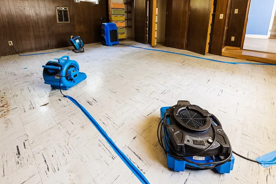 A high-volume air mover running on a floor in a Williamstown, NJ home